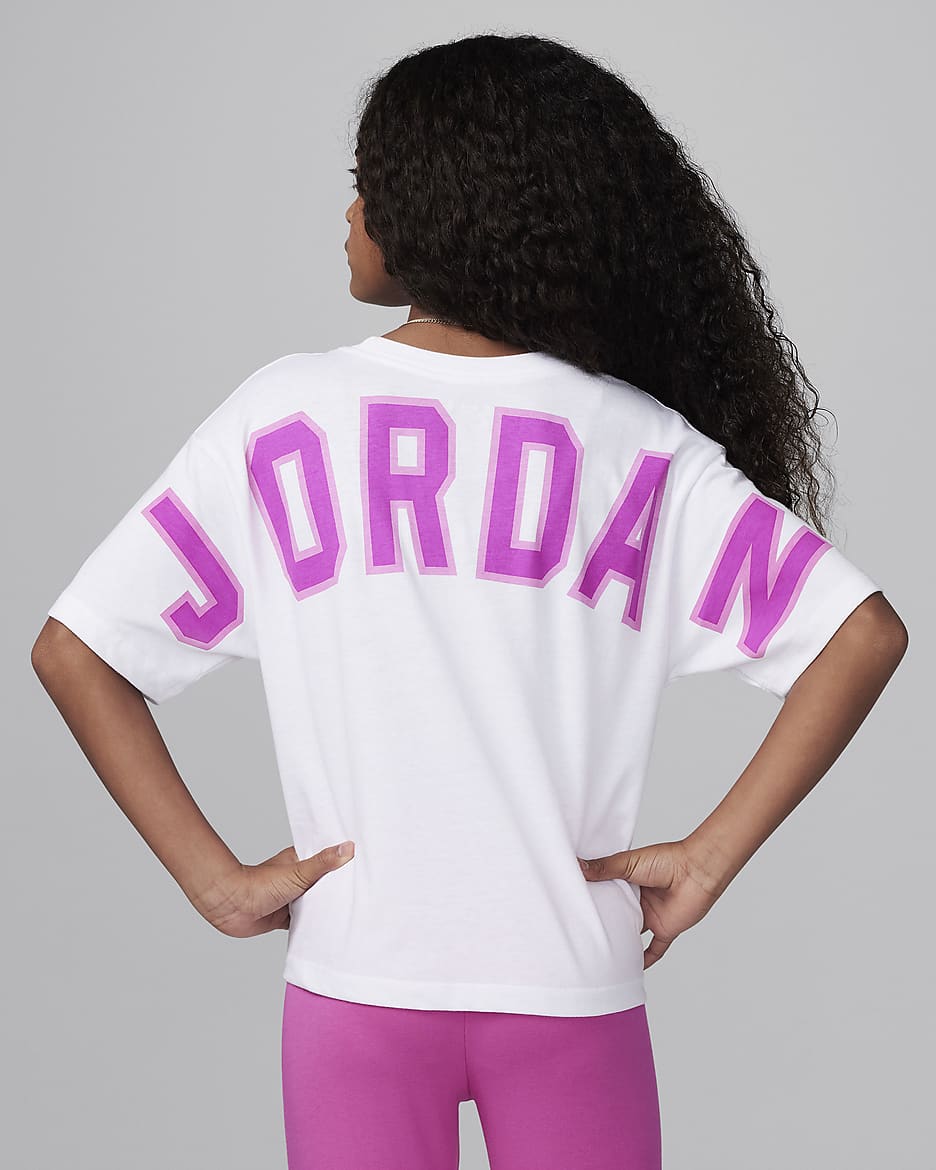 Pink and white jordan shirt sales